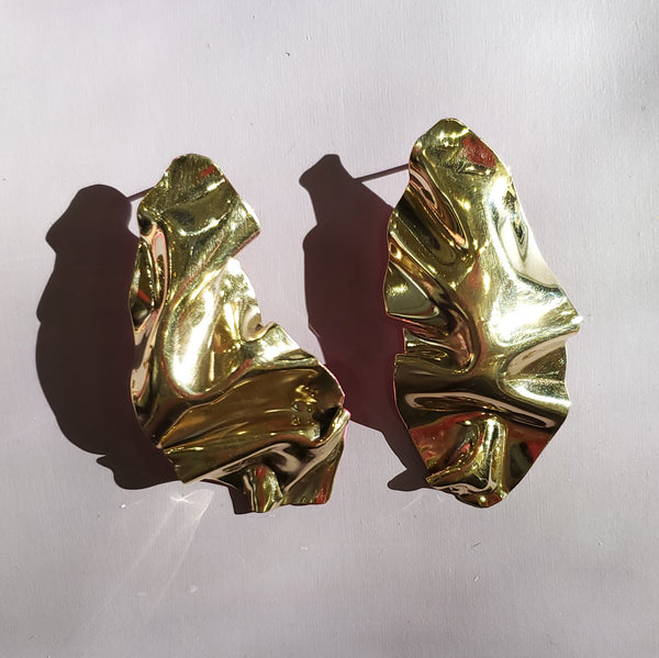 folded brass studs