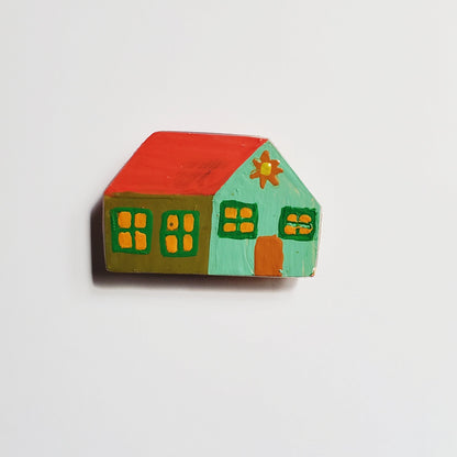Colorful folk house magnet